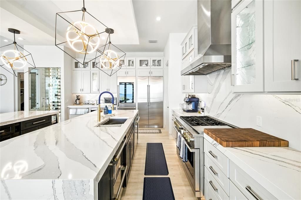 Chandelier, Interior, Kitchen, Pendant Lights, Recessed Lighting, Stainless Steel Appliances, Wood Texture Flooring