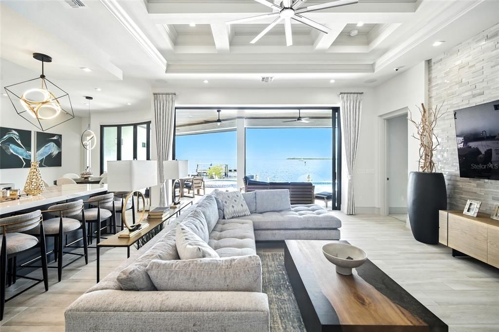 Dining room, Interior, Living room, Pendant Lights, Recessed Lighting, Stone Walls, Water, Wood Texture Flooring