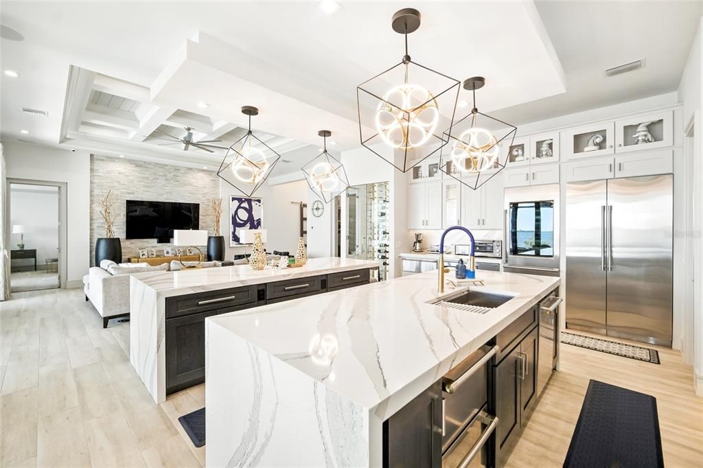 Chandelier, Interior, Kitchen, Living room, Pendant Lights, Recessed Lighting, Stainless Steel Appliances, Wood Texture Flooring