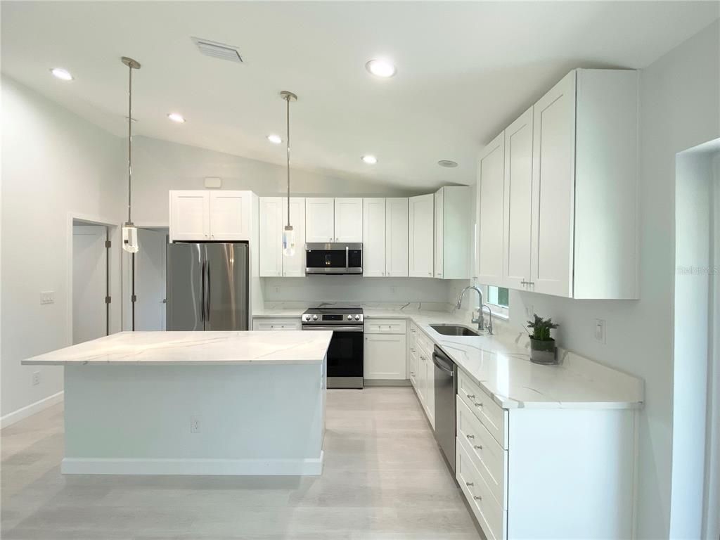 Interior, Kitchen, Pendant Lights, Recessed Lighting, Stainless Steel Appliances, Wood Texture Flooring