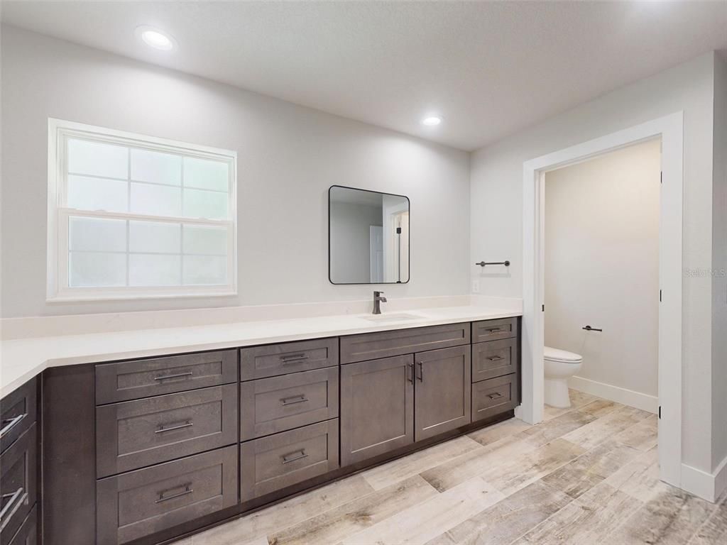 Bathroom, Dual Sink Vanities, Interior, Recessed Lighting, Wood Texture Flooring