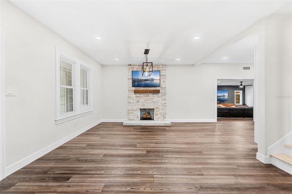 Empty room, Fireplace, Interior, Pendant Lights, Recessed Lighting, Wood Texture Flooring