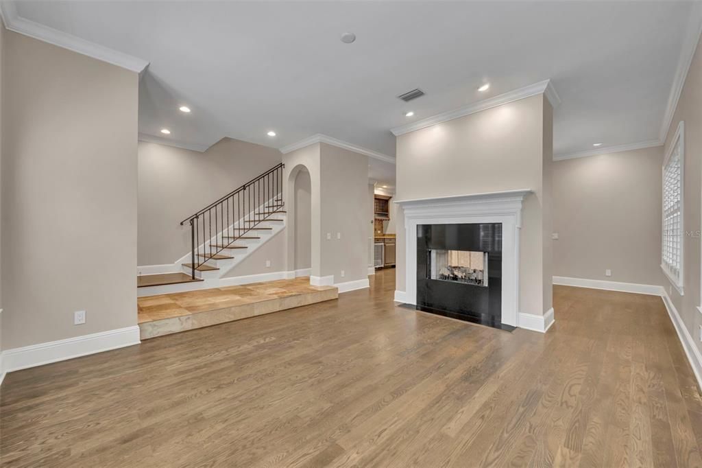 Empty room, Fireplace, Interior, Recessed Lighting, Wood Texture Flooring