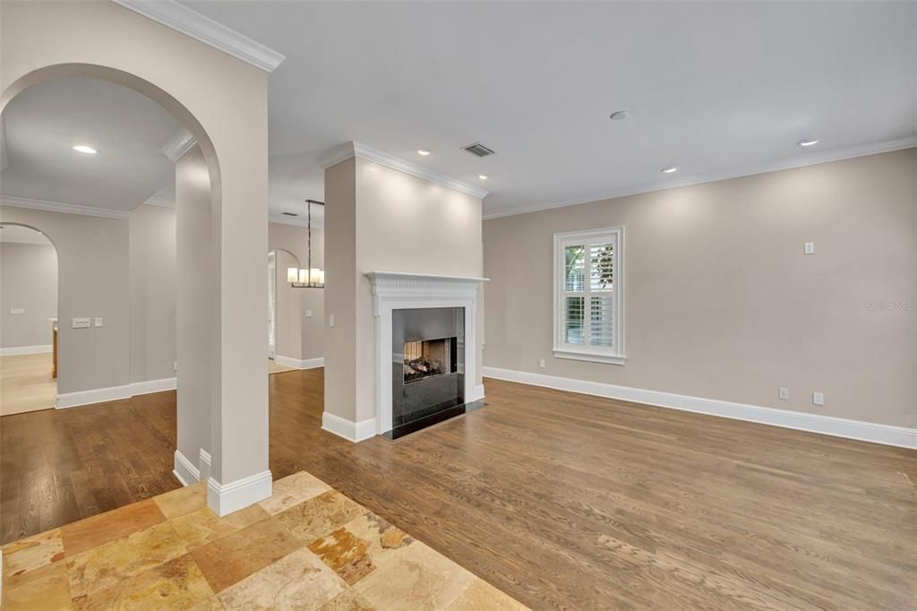 Empty room, Fireplace, Interior, Pendant Lights, Recessed Lighting, Wood Texture Flooring