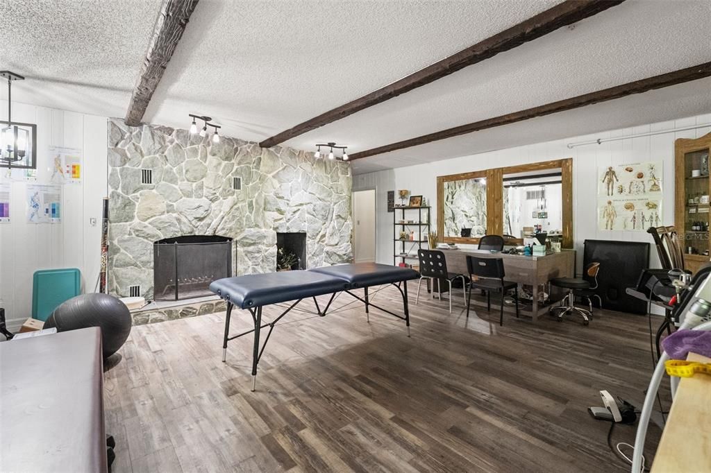 Dining room, Fireplace, Interior, Pendant Lights, Stone Walls, Wooden Beams, Wood Texture Flooring