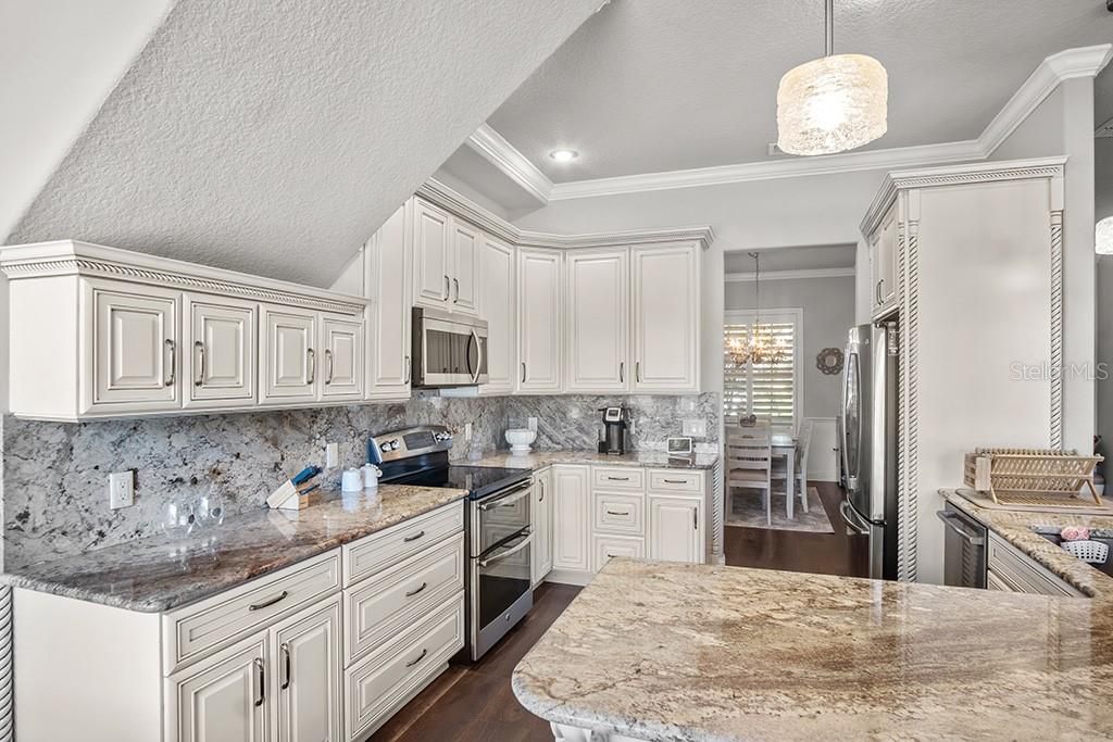 Chandelier, Interior, Kitchen, Pendant Lights, Recessed Lighting, Stainless Steel Appliances, Wood Texture Flooring