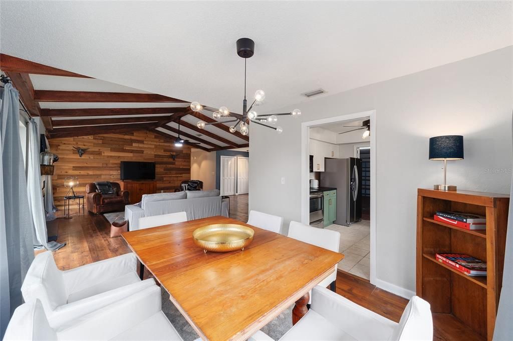 Dining room, Interior, Kitchen, Living room, Pendant Lights, Stainless Steel Appliances, Wooden Beams, Wood Texture Flooring, Wooden Walls