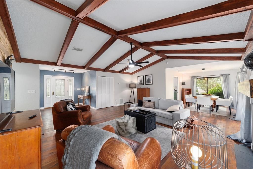 Dining room, Fireplace, Interior, Living room, Pendant Lights, Wooden Beams, Wood Texture Flooring