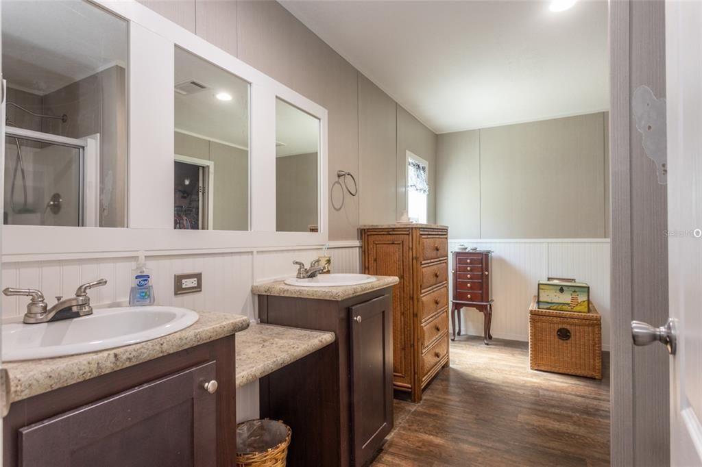 Bathroom, Dual Sink Vanities, Interior, Recessed Lighting, Wood Texture Flooring