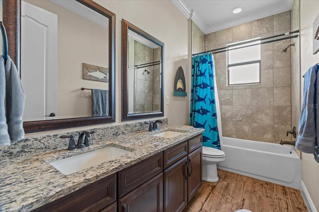 Bathroom, Dual Sink Vanities, Interior, Recessed Lighting, Wood Texture Flooring