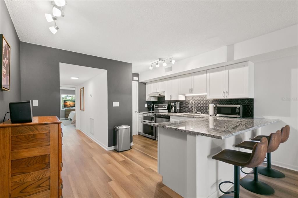 Interior, Kitchen, Recessed Lighting, Stainless Steel Appliances, Wood Texture Flooring