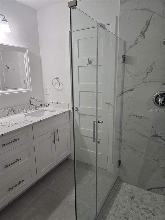Bathroom, Dual Sink Vanities, Glass Shower, Interior, Marble Walls