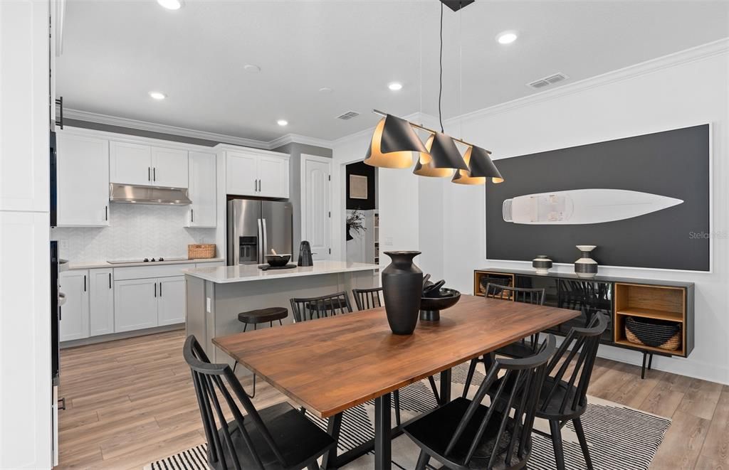 Dining room, Interior, Kitchen, Pendant Lights, Recessed Lighting, Stainless Steel Appliances, Wood Texture Flooring