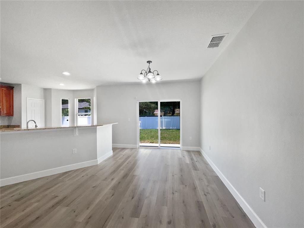 Chandelier, Empty room, Interior, Recessed Lighting, Wood Texture Flooring