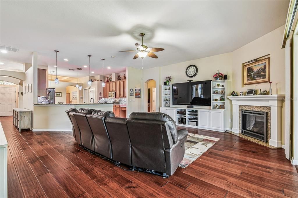 Home Theatre Room, Fireplace, Interior, Kitchen, Living room, Pendant Lights, Recessed Lighting, Wood Texture Flooring