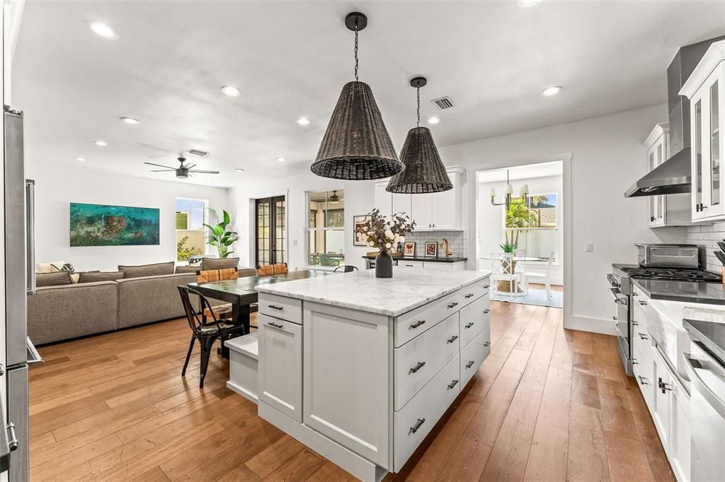 Dining room, Interior, Kitchen, Living room, Pendant Lights, Recessed Lighting, Stainless Steel Appliances, Wood Texture Flooring