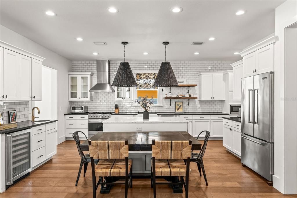 Dining room, Interior, Kitchen, Pendant Lights, Recessed Lighting, Stainless Steel Appliances, Wood Texture Flooring