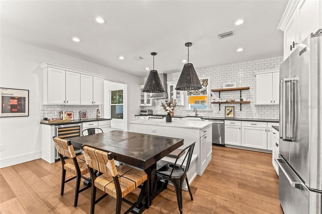 Dining room, Interior, Kitchen, Pendant Lights, Recessed Lighting, Stainless Steel Appliances, Wood Texture Flooring