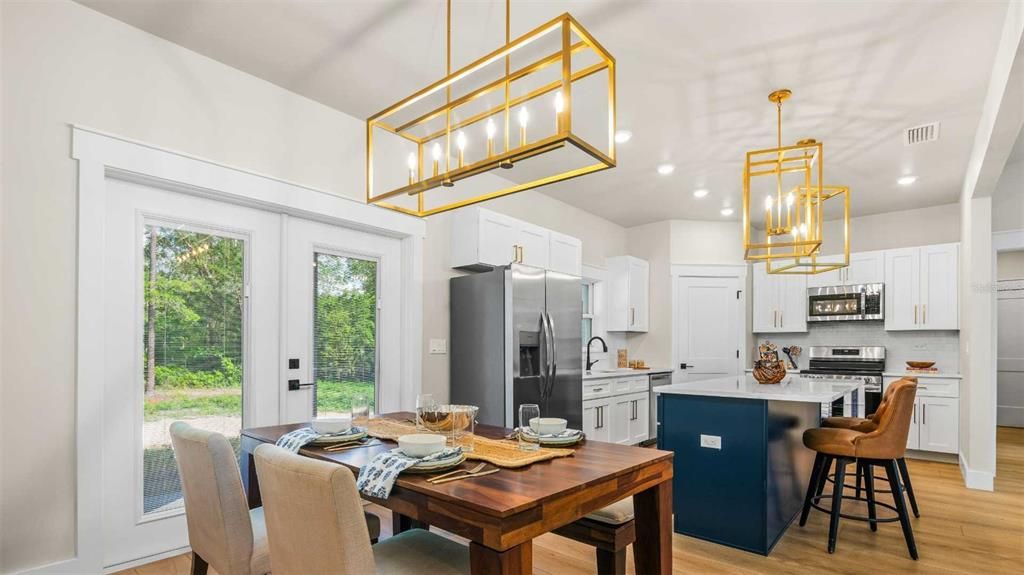Dining room, Interior, Kitchen, Pendant Lights, Recessed Lighting, Stainless Steel Appliances, Wood Texture Flooring