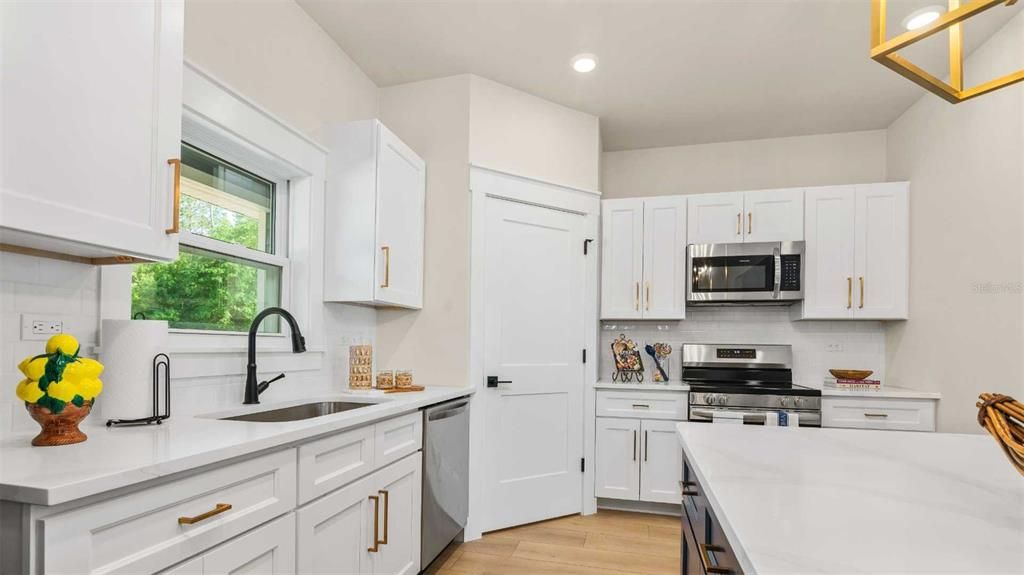 Interior, Kitchen, Recessed Lighting, Stainless Steel Appliances, Wood Texture Flooring