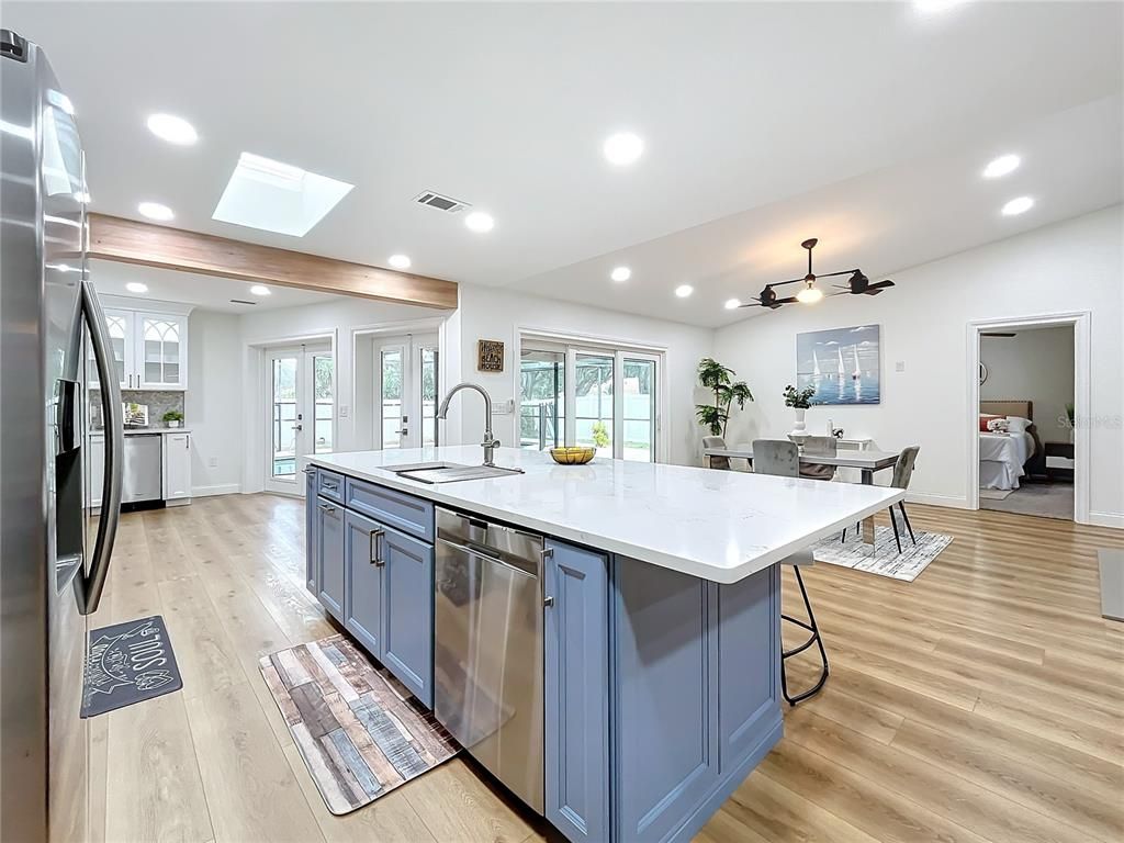 Dining room, Interior, Kitchen, Recessed Lighting, Stainless Steel Appliances, Wood Texture Flooring
