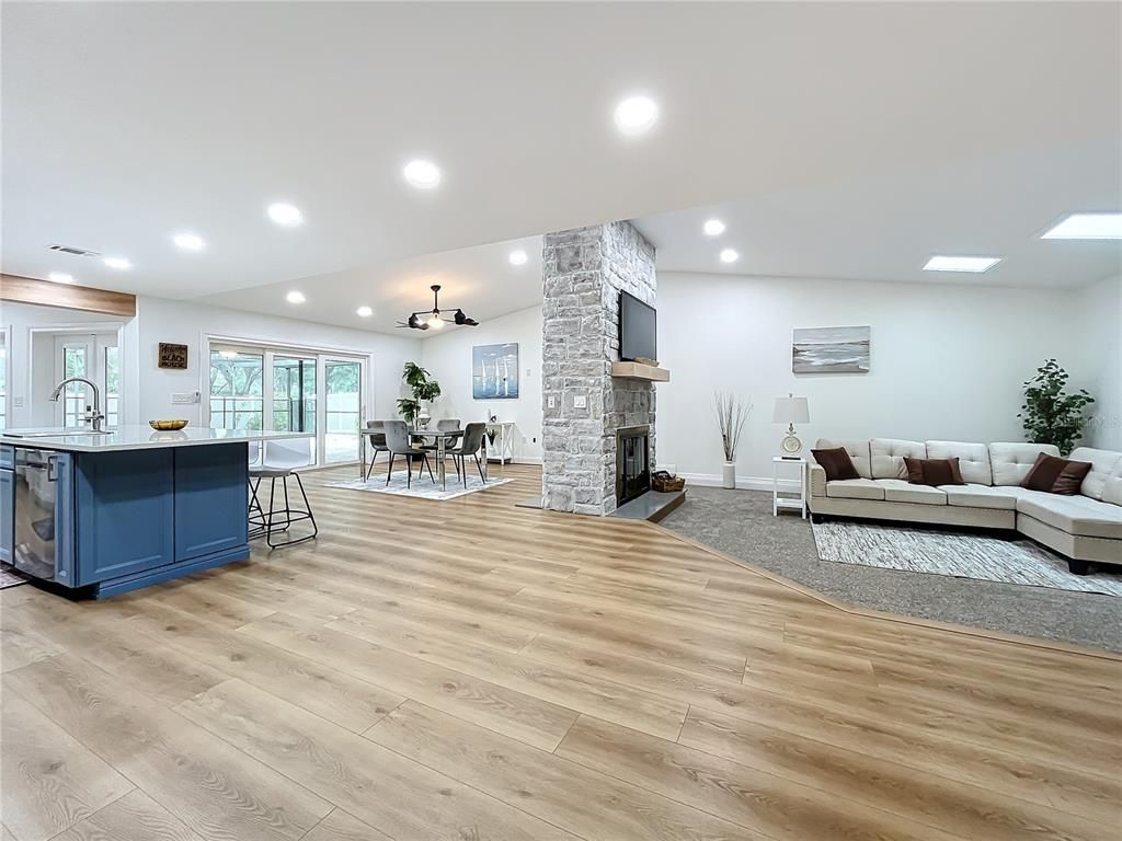 Dining room, Fireplace, Interior, Kitchen, Living room, Pendant Lights, Recessed Lighting, Stone Walls, Wood Texture Flooring