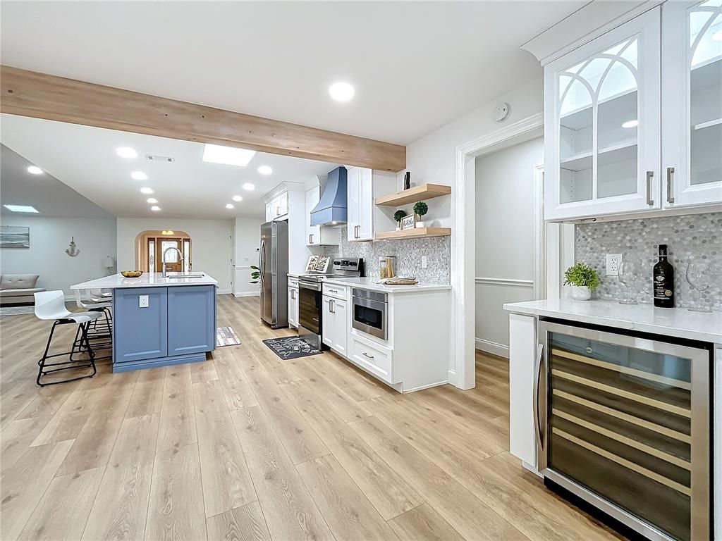 Dining room, Interior, Kitchen, Recessed Lighting, Stainless Steel Appliances, Wooden Beams, Wood Texture Flooring