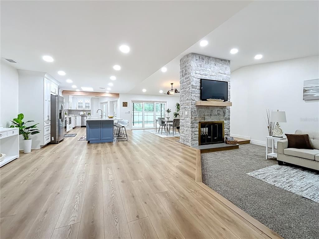 Dining room, Fireplace, Interior, Kitchen, Pendant Lights, Recessed Lighting, Stone Walls, Wood Texture Flooring