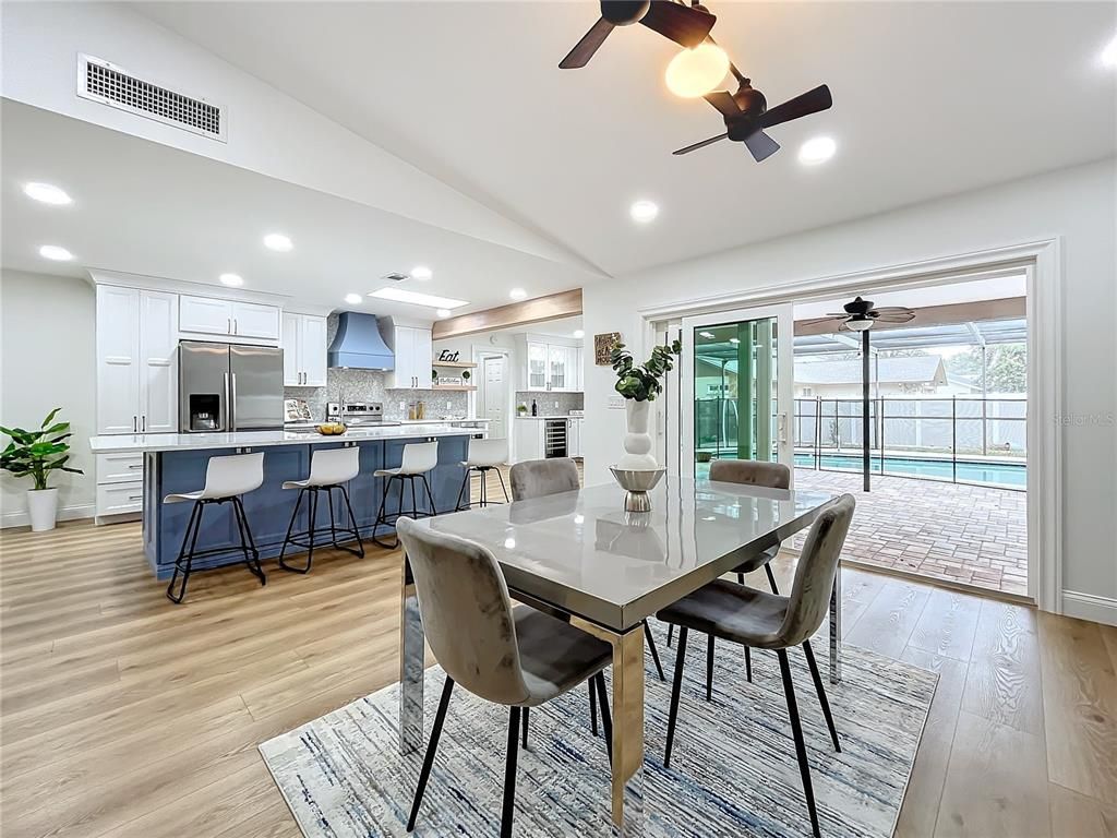 Dining room, Interior, Kitchen, Recessed Lighting, Stainless Steel Appliances, Wood Texture Flooring
