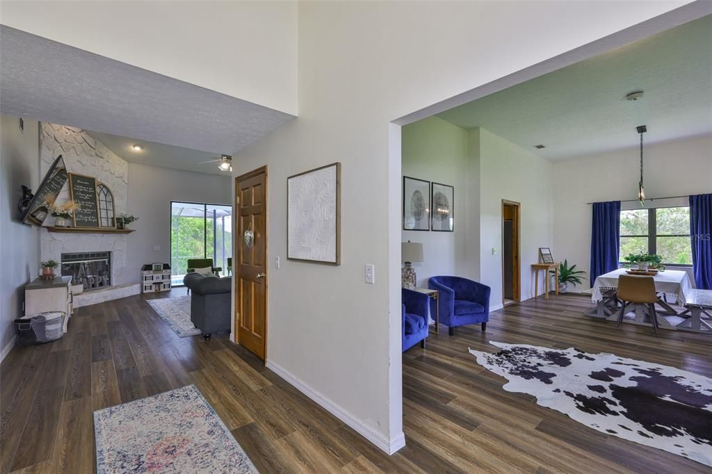 Dining room, Fireplace, Interior, Pendant Lights, Recessed Lighting, Wood Texture Flooring