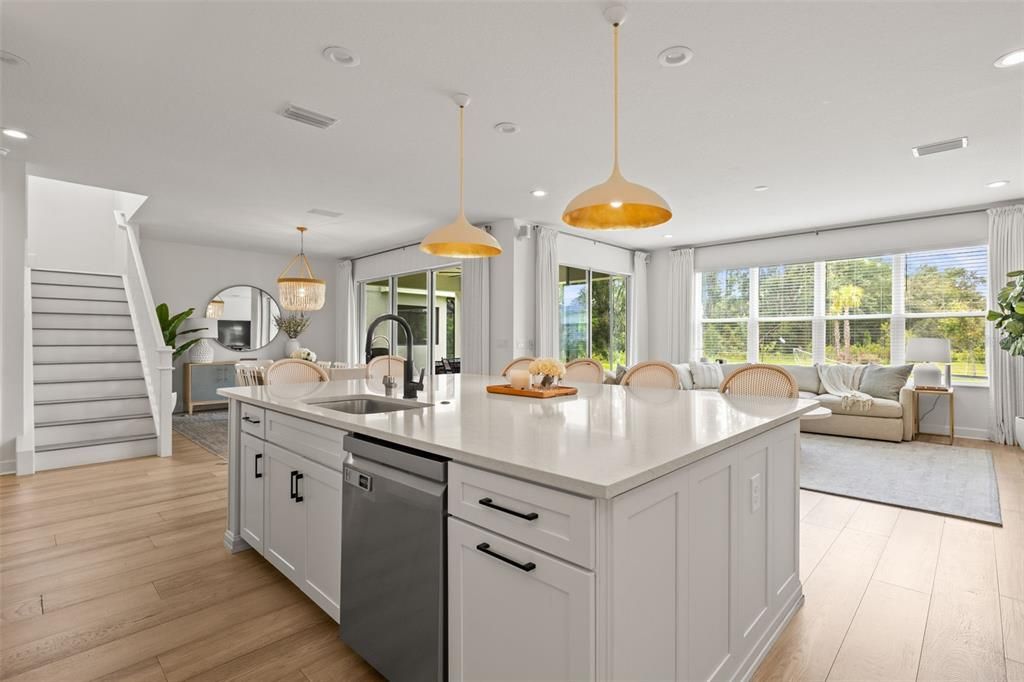 Dining room, Interior, Kitchen, Pendant Lights, Recessed Lighting, Stainless Steel Appliances, Wood Texture Flooring