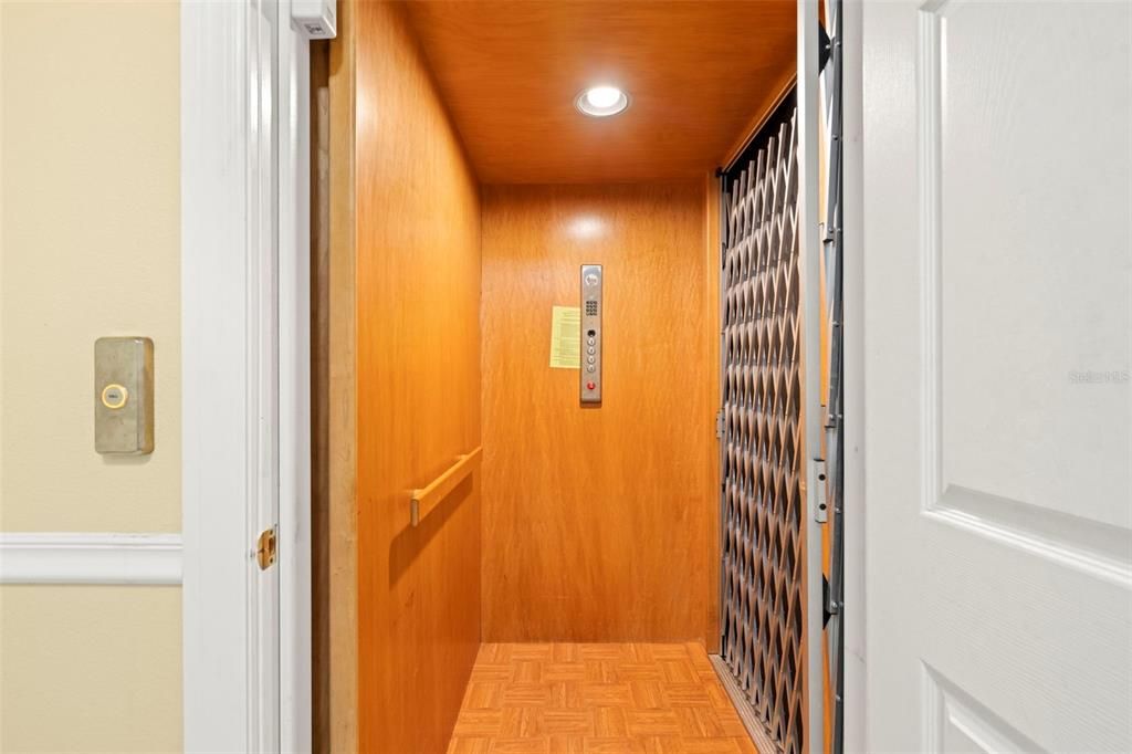 Elevator, Interior, Recessed Lighting, Wooden Ceilings, Wood Texture Flooring, Wooden Walls
