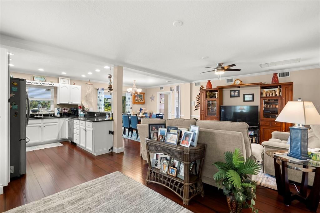 Chandelier, Dining room, Interior, Kitchen, Living room, Recessed Lighting, Wood Texture Flooring