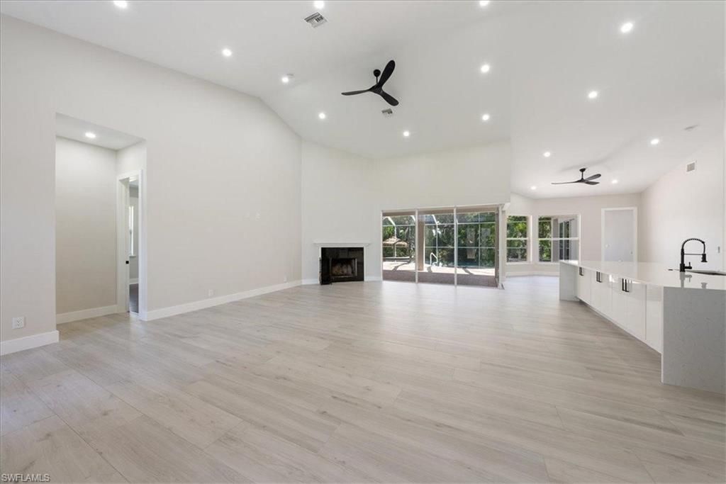 Empty room, Fireplace, Interior, Recessed Lighting, Wood Texture Flooring