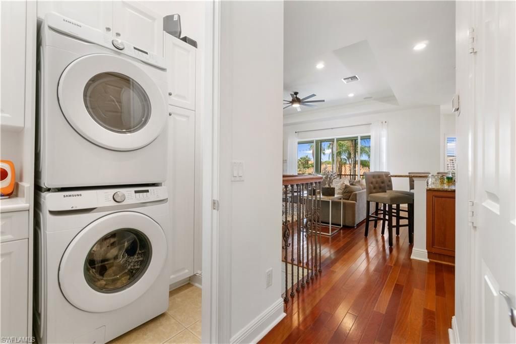Interior, Living room, Recessed Lighting, Utility Closets, Washer, Wood Texture Flooring
