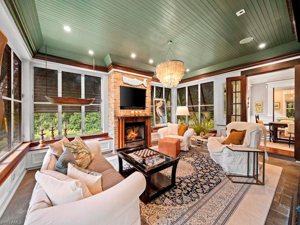 Chandelier, Fireplace, Interior, Living room, Recessed Lighting, Stone Walls