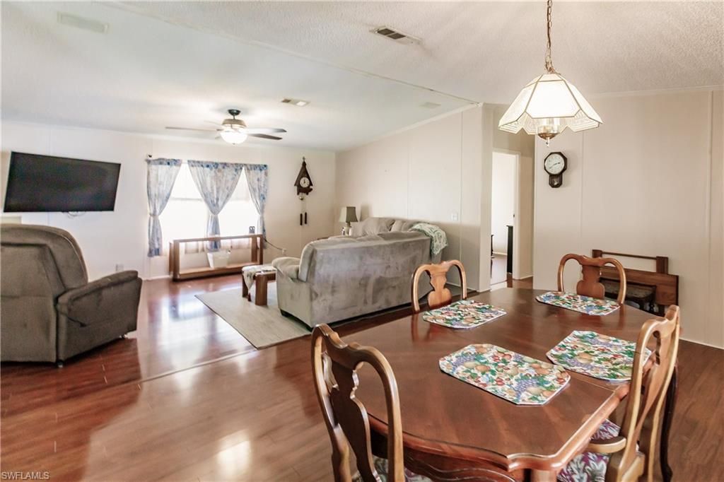 Dining room, Interior, Living room, Pendant Lights, Wood Texture Flooring