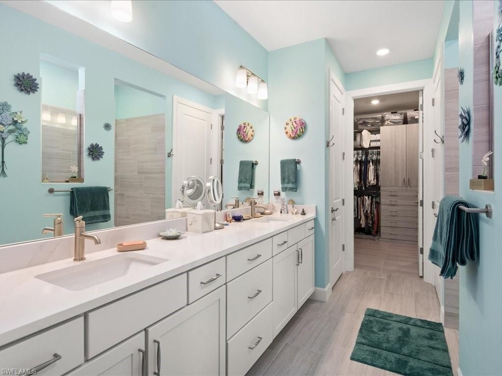 Bathroom, Dual Sink Vanities, Interior, Recessed Lighting, Walk-in Closets, Wood Texture Flooring