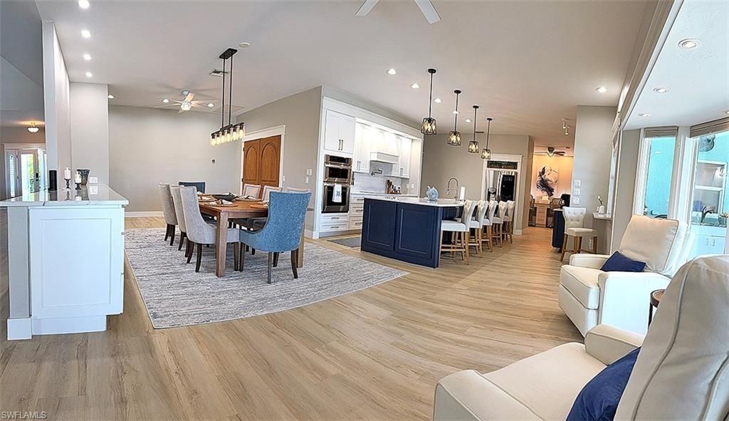 Dining room, Interior, Kitchen, Pendant Lights, Recessed Lighting, Stainless Steel Appliances, Wood Texture Flooring