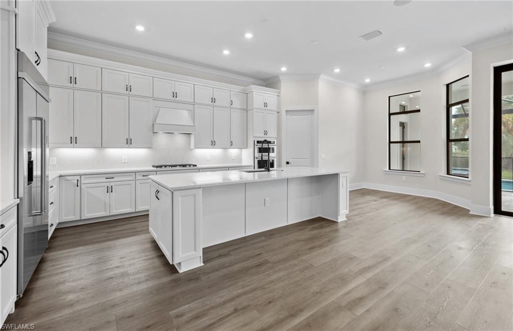 Interior, Kitchen, Recessed Lighting, Stainless Steel Appliances, Wood Texture Flooring