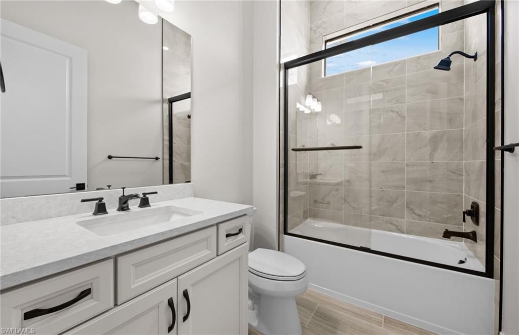 Bathroom, Glass Shower, Interior, Marble Walls, Wood Texture Flooring