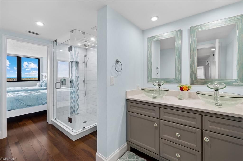 Bathroom, Bedroom, Dual Sink Vanities, Glass Shower, Interior, Recessed Lighting, Wood Texture Flooring