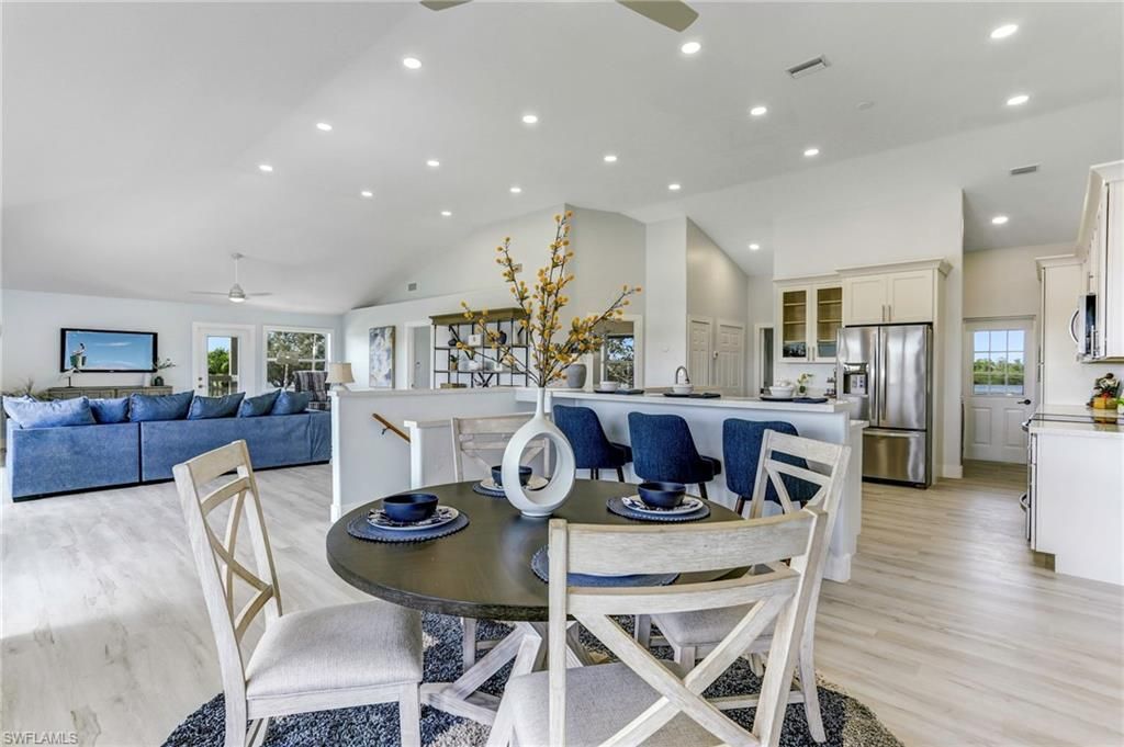 Dining room, Interior, Kitchen, Living room, Recessed Lighting, Stainless Steel Appliances, Wood Texture Flooring
