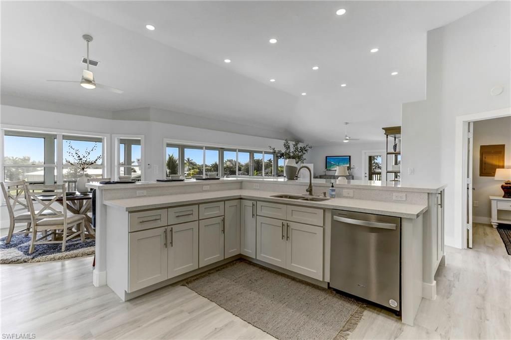 Dining room, Interior, Kitchen, Recessed Lighting, Stainless Steel Appliances, Wood Texture Flooring
