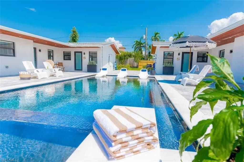 Exterior, Pool, Solar Panels