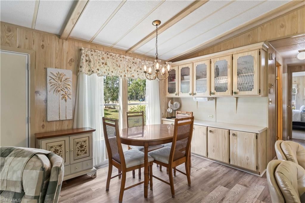 Chandelier, Dining room, Interior, Wood Texture Flooring, Wooden Walls