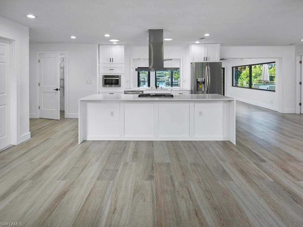 Interior, Kitchen, Recessed Lighting, Stainless Steel Appliances, Wood Texture Flooring