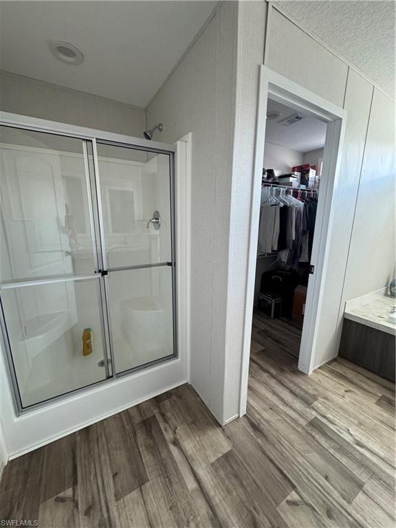 Bathroom, Glass Shower, Interior, Walk-in Closets, Wood Texture Flooring