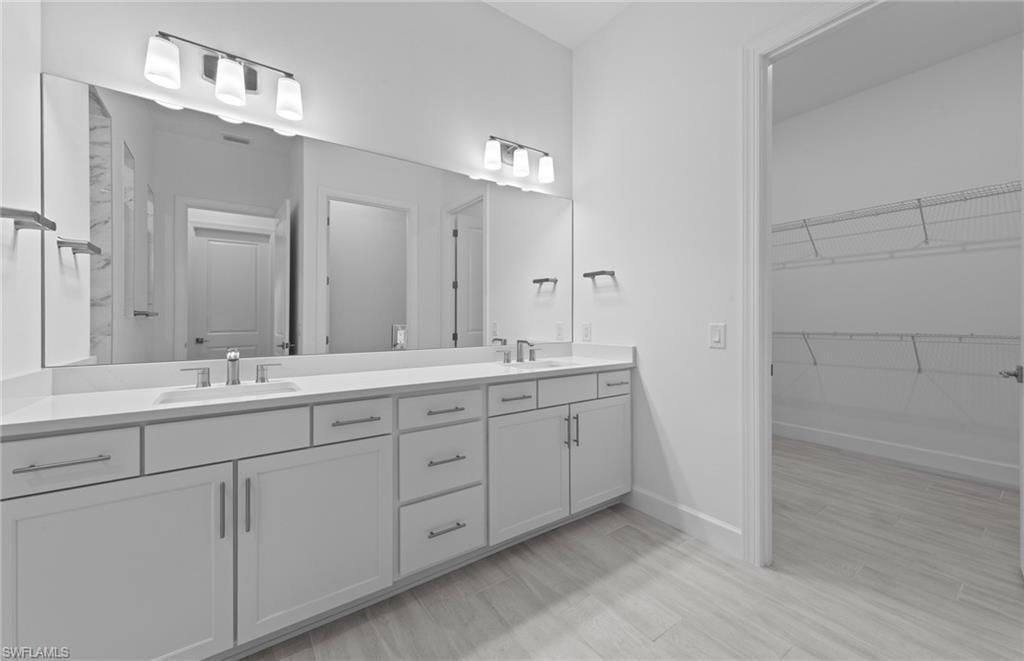 Bathroom, Dual Sink Vanities, Interior, Walk-in Closets, Wood Texture Flooring