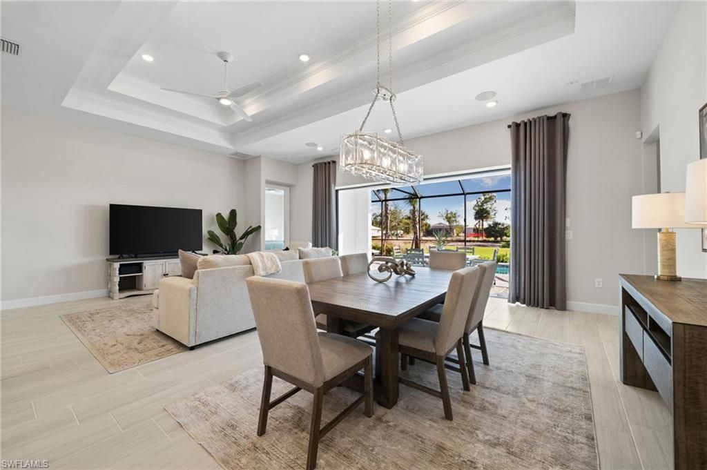 Chandelier, Dining room, Interior, Living room, Pendant Lights, Recessed Lighting, Wood Texture Flooring